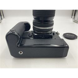 Nikon FM2n camera body, serial no. N8683100, with 'Nikon Zoom-NIKKOR 35-70mm 1:3.3-4.5' len, serial no. 2236565, Nikon MF-16 data back, serial no. 212905 and Nikon MD-12 Motor Drive, serial no 1570382 