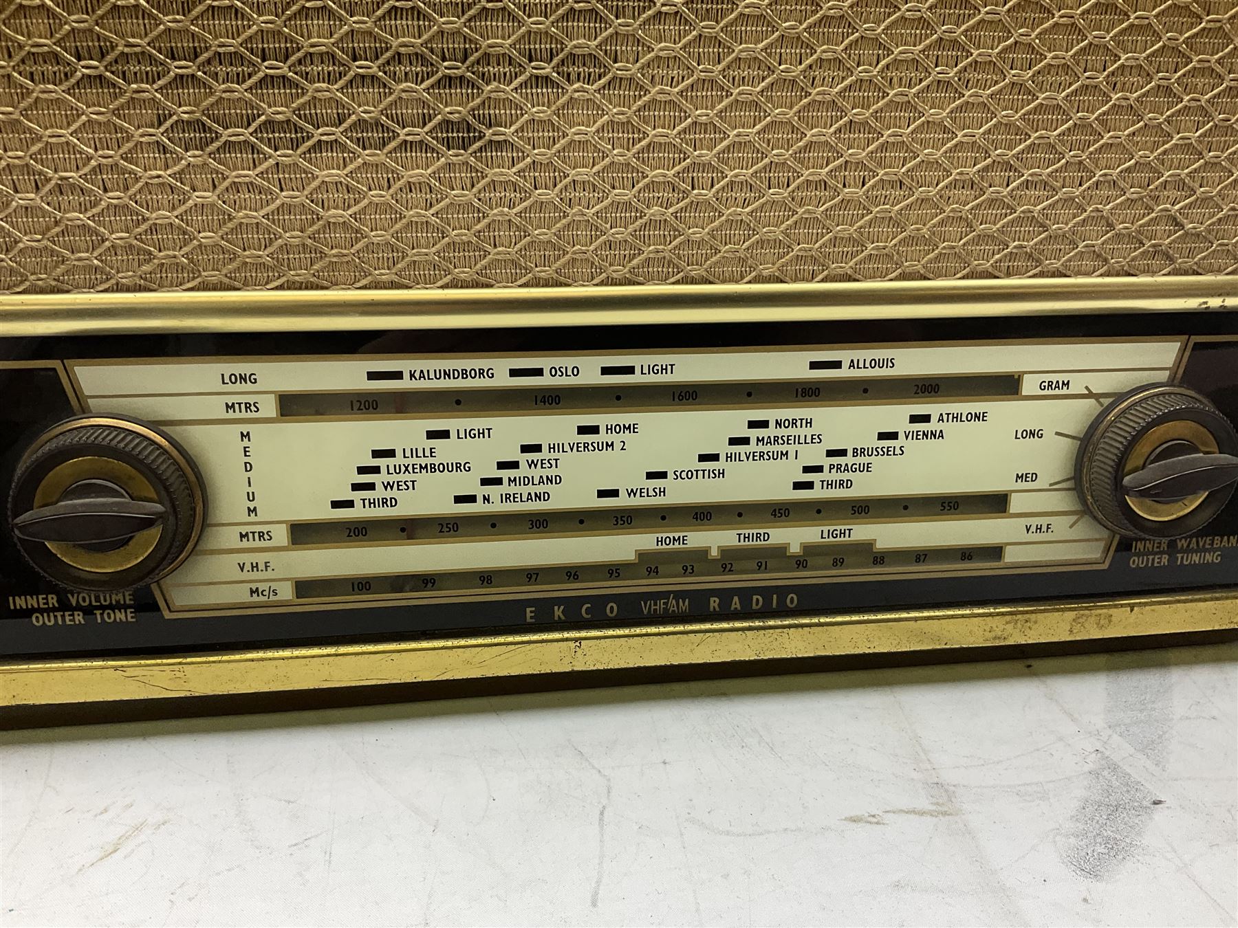 1955 Pye Fenman II valve radio in walnut veneered case, W58cm, together with a 1950s McMichael Type 854 valve radio with Bakelite knobs, W47cm H39cm D24cm, and 1957 Ekco Type A320 radio in dark walnut veneered case (3)