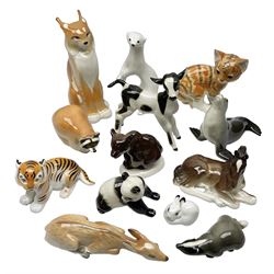 Collection of Russian Lomonosov USSR animal figures, to include  lynx, tiger, red panda, sealion, panada, etc 