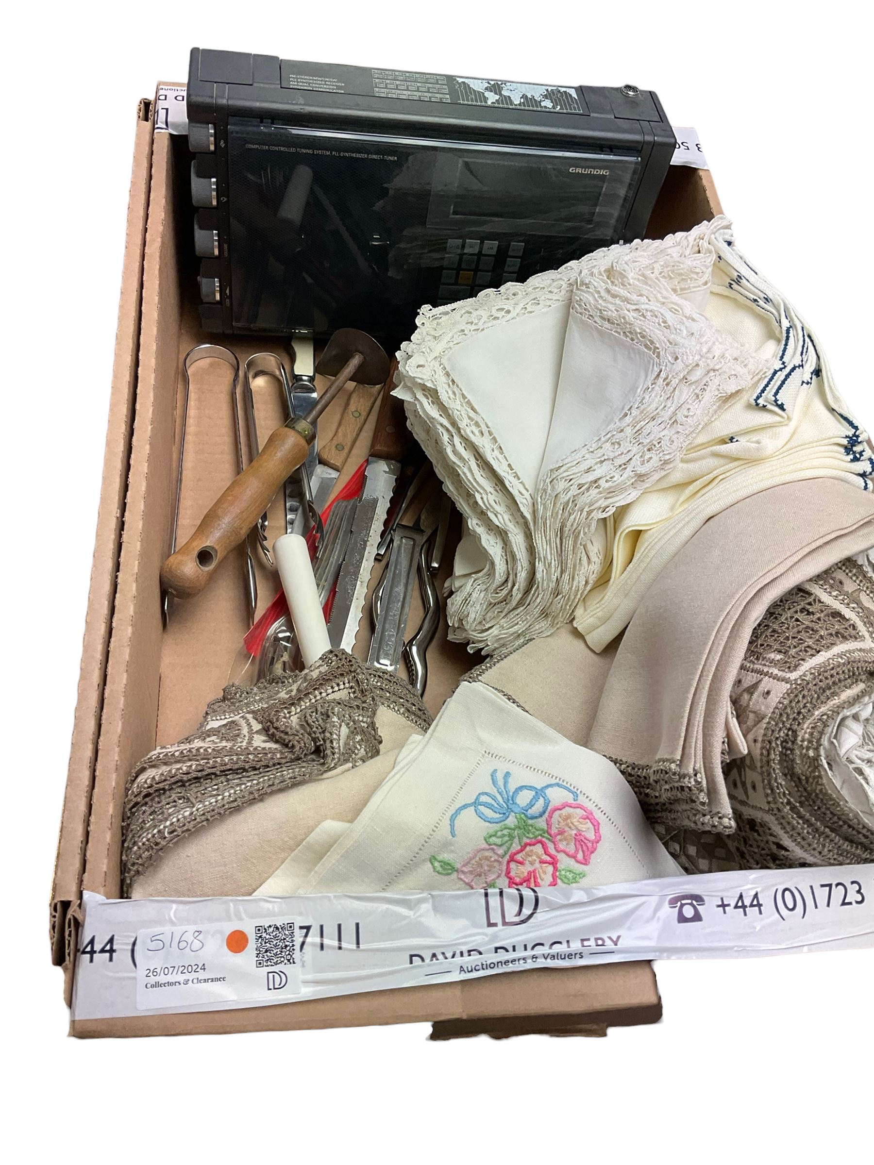 Grundig Satellit 500 radio, table linen, Cambridge University car badge, hip flask, various flatware etc in two boxes