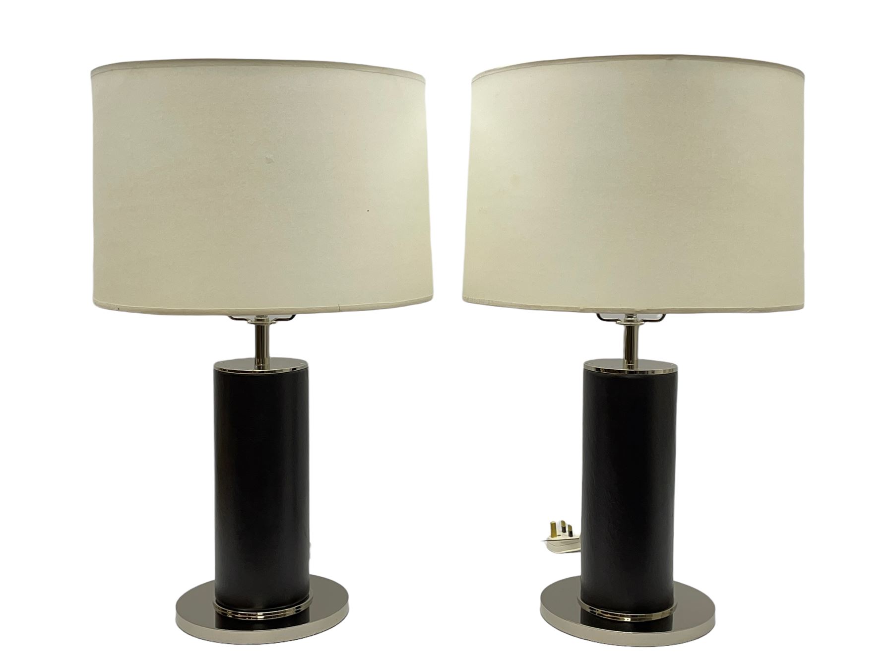 Ralph Lauren - pair 'Beckford' table lamps, cylindrical form in chocolate brown leather, polished metal base, with shades