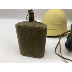 Early 20th century British army peaked cap with Scots Guards brass badge; another later with Scots Guards Staybrite badge; modern pith helmet; British army water bottle with later webbing cover; pair of Carl Zeiss blc 7 x 50 binoculars; and Dunn & Co bowler hat