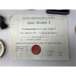 Silver 1969 Cunard RMS Queen Elizabeth maiden voyage commemorative medallion, in original Slade, Hampton & Son case with certificate, two Stratton R.M.S Queen Elizabeth mirror compacts, Stratton R.M.S Queen Mary compact, mid 20th century P&O Canberra Round World Voyage miniature globe, S.S Oriana ash tray modelled as a barrel, Norah Wellings sailor doll, and other maritime and shipping memorabilia 