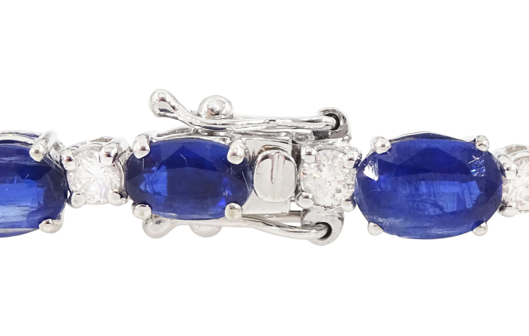 18ct white gold oval cut kyanite and round brilliant cut diamond bracelet, stamped, total kyanite weight 19.25 carat, total diamond weight 1.50 carat, with Wold Gemological Institute report