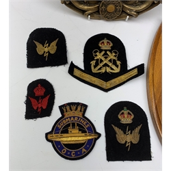  Two Submarine Force US Atlantic Fleet presentation plaques, the first detailed Subron 14, the second USS Abraham Lincoln 602, each H32.5cm, together with five uniform patches, four cap tallies, detailed HSM Tamar (x3), and HMS Ganges, and a set of two limited edition Euro Tunnel commemorative presentation plaques, The Breakthrough 1st December 1990 and Celebration 6th May 1994, D27cm, complete with original certificates.  