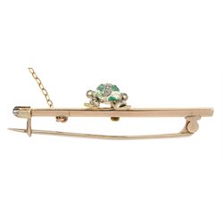 Edwardian frog and spear brooch, the gold and silver green enamel spinning frog set with old cut diamonds and stone set eyes, sat on a gold spear, with registered design number Rd 364025
