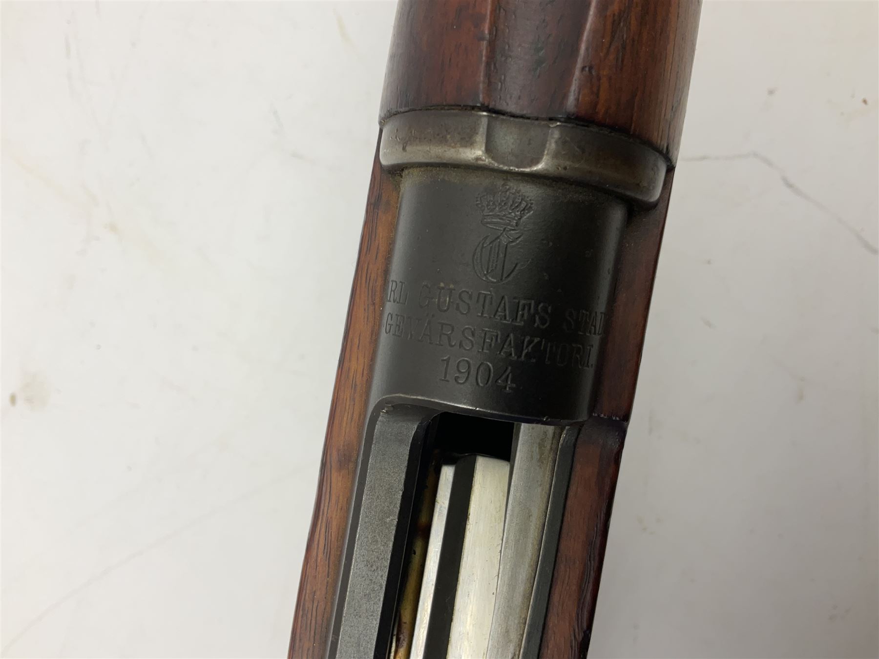 Early 20c Swedish 6.5mm bolt-action service rifle inscribed Carl Gustafs Stads Gevarsfaktori 1904; with 74cm barrel and original Model 1896 knife bayonet with scabbard No.149918 L149cm overall. Deactivated to early specification so requires re-deactivation to modern standards SECTION 1 RFD ONLY