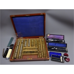  Edwardian Opticians sight testing set containing approx. 220 Concave & Convex and other lenses in fitted mahogany case, L44cm D35cm, Keeler Pantoscope and Opthalmascopes, three Claritas, two Brannan and one Zeal thermometers, a testing kit etc   