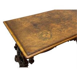 Victorian figured walnut stretcher side table, moulded rectangular top with figured book-matched veneers, shaped and pierced end supports carved with foliage and fruit, out-splayed feet carved with scrolled foliage, united by a spiral turned stretcher 