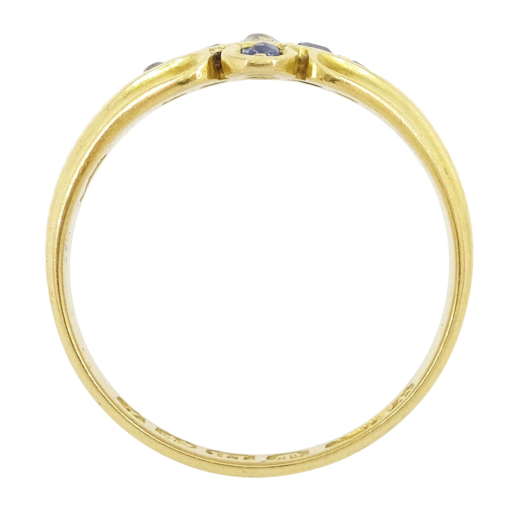 Victorian 18ct gold sapphire and diamond ring, three old cut and single cut diamonds, the principal diamond with four oval cut sapphire surround, to a ridged design shank, Birmingham 1899