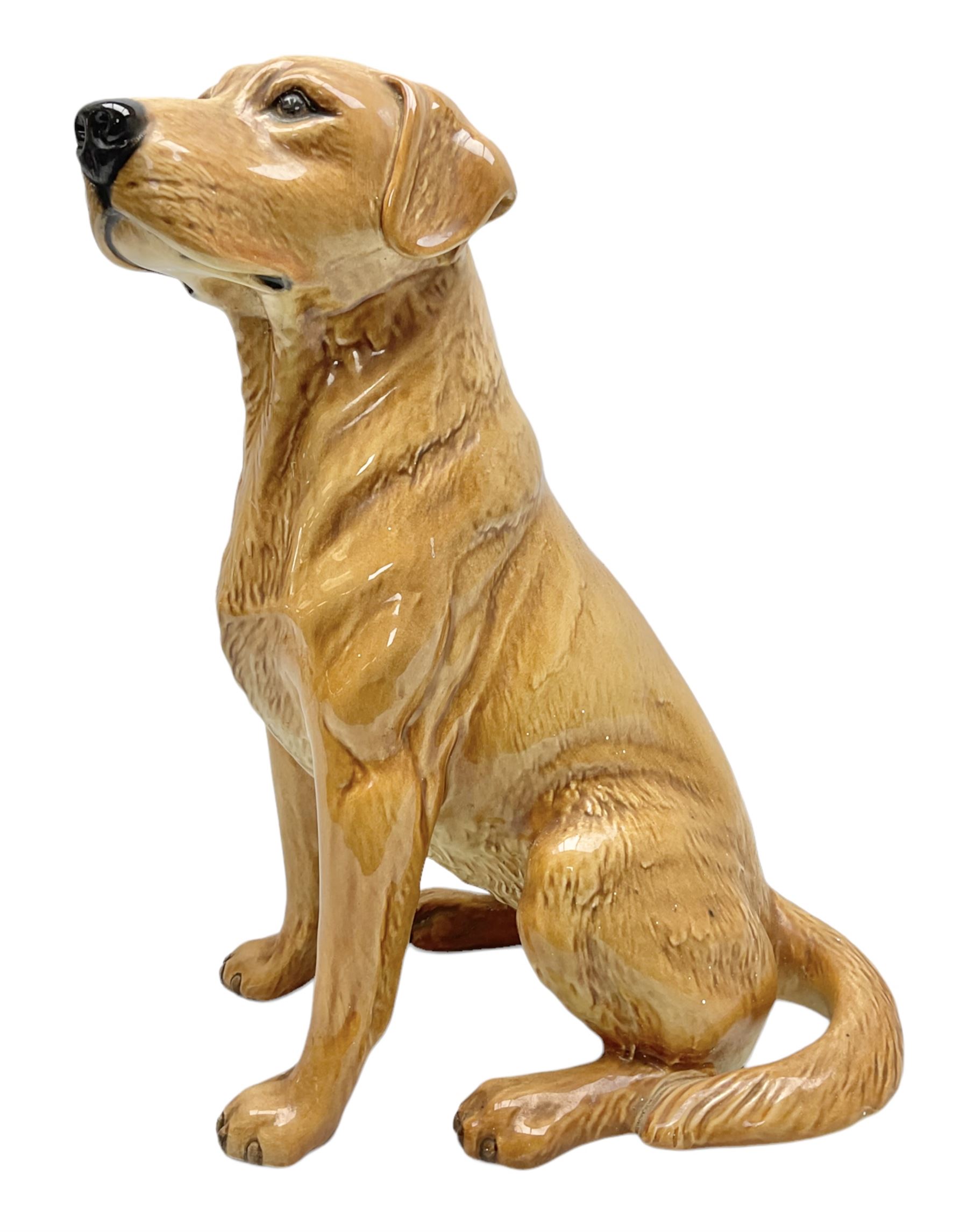 Large Beswick fire side figure of a yellow labrador, modelled seated, no. 2314, with impressed marks beneath, H34cm