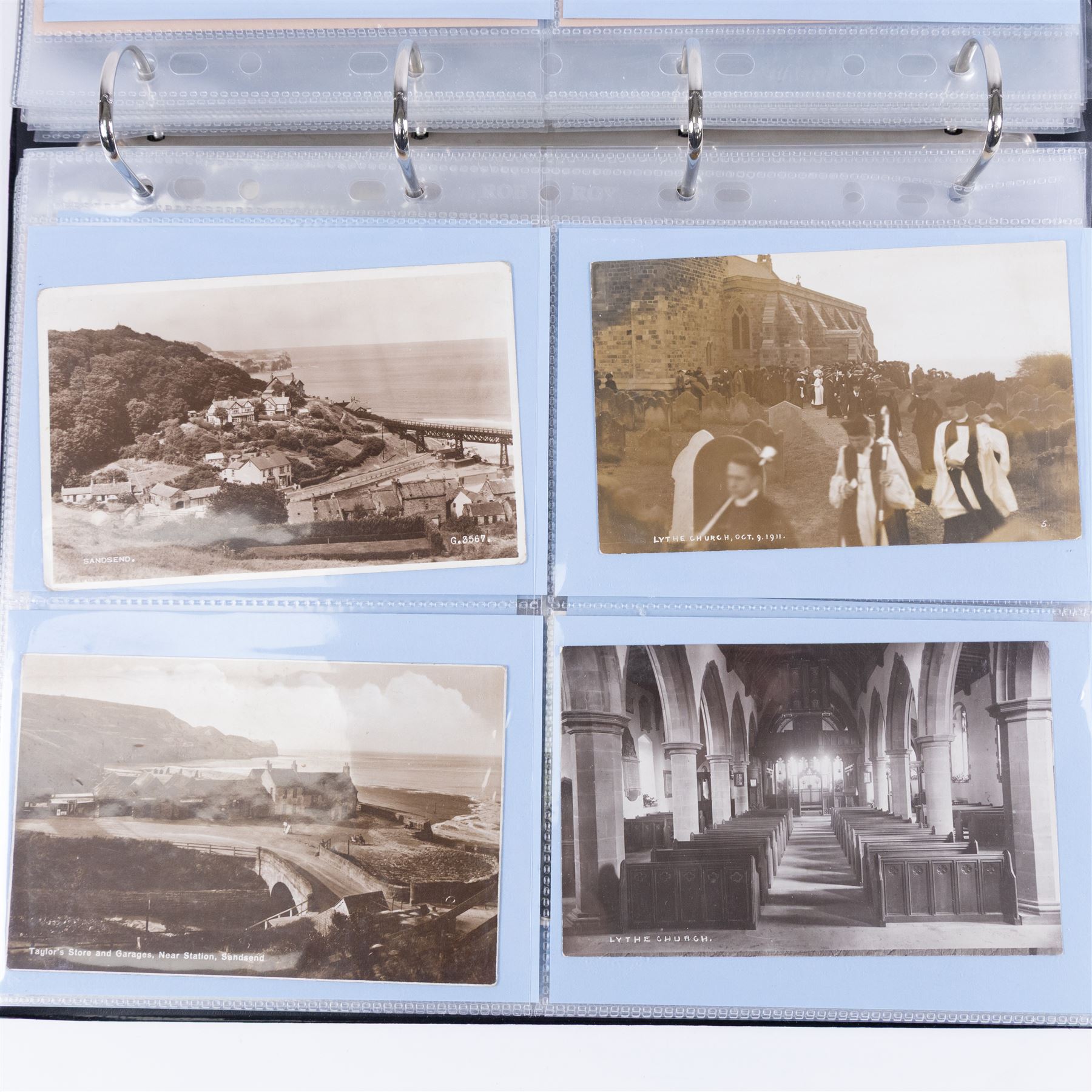 Four-hundred and twelve early 20th century Whitby District view real photographic postcards, including a selection from the Whitby Coast (176), starting at Staithes and Runswick Bay down to Robin Hoods Bay and a selection from the Valley of the River Esk (236), including Ruswarp, Rig Mill, Sneaton, Sleights, Grosmont, Egton, Glaisdale, Danby, Castleton and Goathland, all housed within two postcard albums