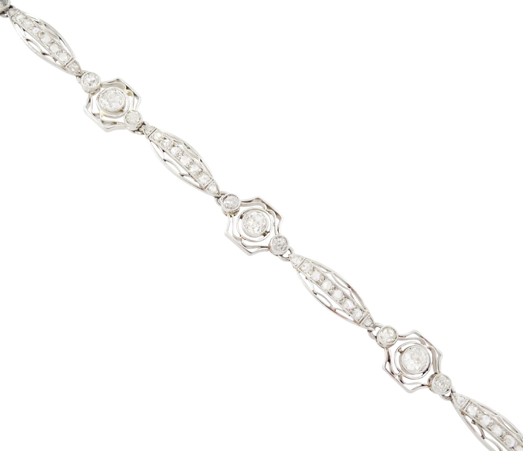 Art Deco French platinum diamond bracelet, six pierced design navette shaped links, set with rose cut diamonds, each spaced by three old cut diamonds, milgrain set in a pierced fancy hexagonal setting, dogs head hallmark, total diamond weight approx 2.00 carat