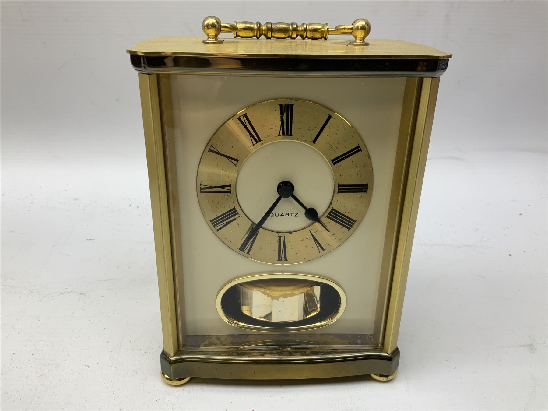 Pure Digital Evoke-1XT DAB digital radio and additional speaker, together with Quartz mantel clock