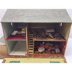Scratch-built wooden doll's house of double fronted form with side garage, simulated brick walls under a faux tiled roof, the removable front elevation opening to reveal four partly furnished rooms on two floors with central staircase, wired for battery lighting; base L64cm D40cm H42cm