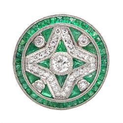 Platinum circular diamond and emerald, fancy design dress ring