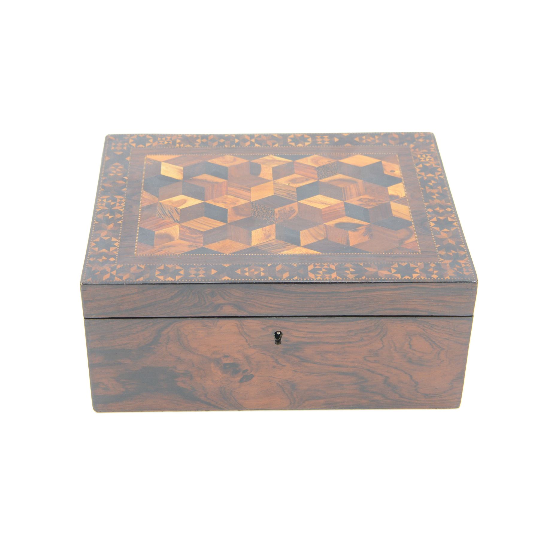 19th century Tunbridge ware marquetry box, the hinged cover decorated with tumbling blocks in specimen timbers and hardwood, within a star border, H10cm W23.5cm D18cm