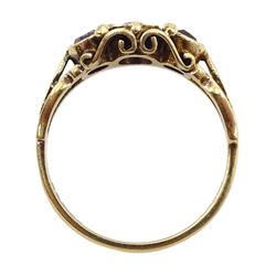 Gold amethyst pendant, stamped 18K, on 9ct gold chain necklace and a 9ct gold three stone amethyst ring, hallmarked