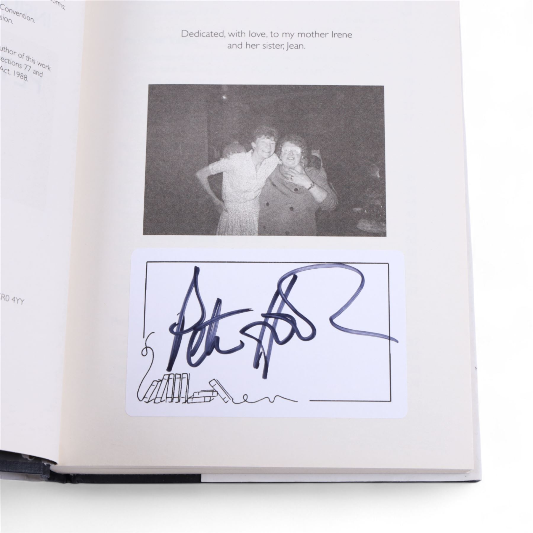 Joy Division/New Order framed album inserts and CDs, both signed by Peter Hook, together with three signed Peter Hook books 'Unknown Pleasures', 'Substance' and 'The Hacienda' and two The Hacienda t-shirts, frame H33cm