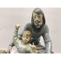 Two Lladro figures, comprising A Christmas Wish no 5711, and A Loving Family no 5848, both with original box, largest example H27cm