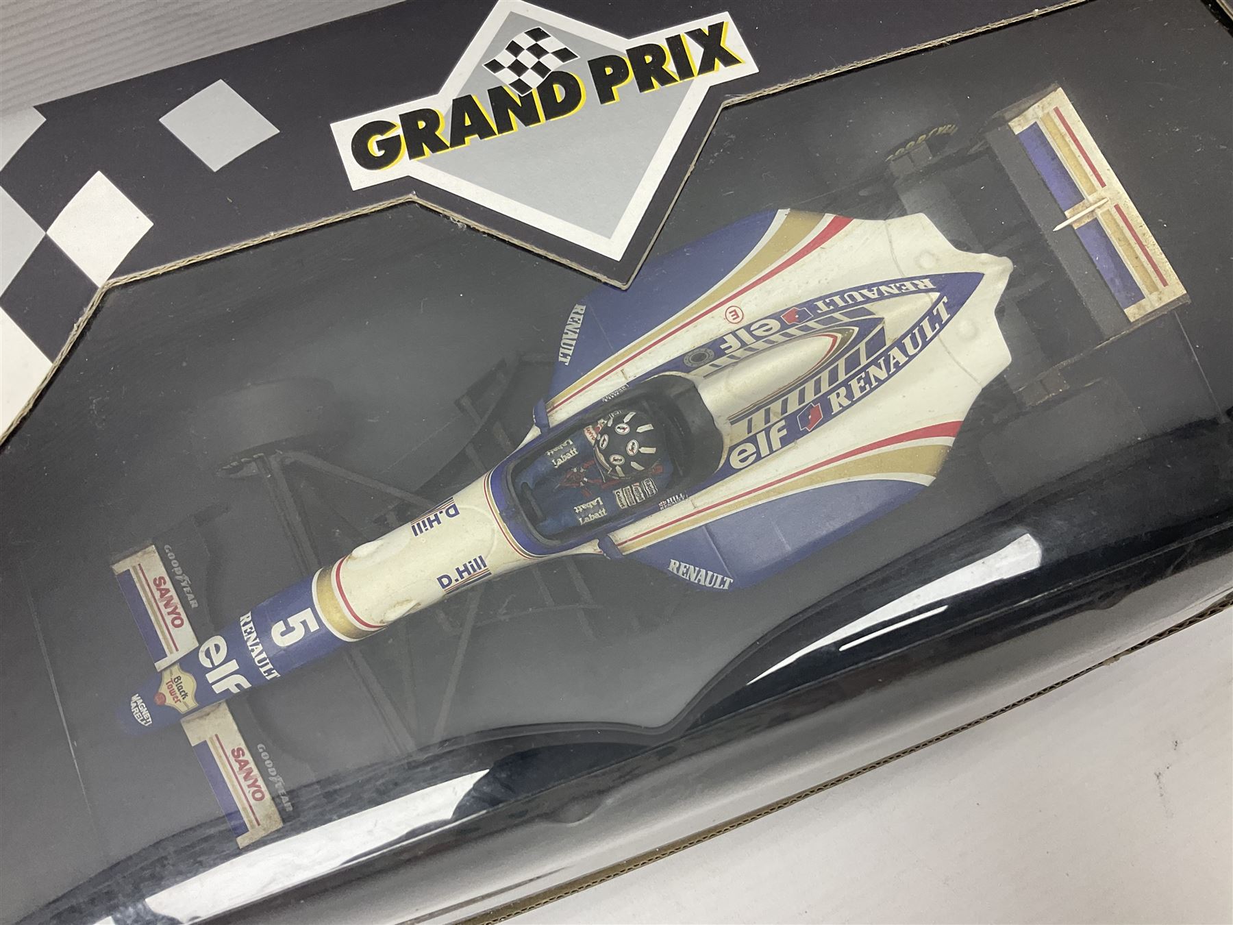 Three Paul's Model Art Grand Prix 1:18 scale die-cast racing cars - Williams Renault FW17 D. Hill; Ferrari 412 T1 J. Alesi; and Ligier Honda JS41 M. Brundle; all boxed (3)