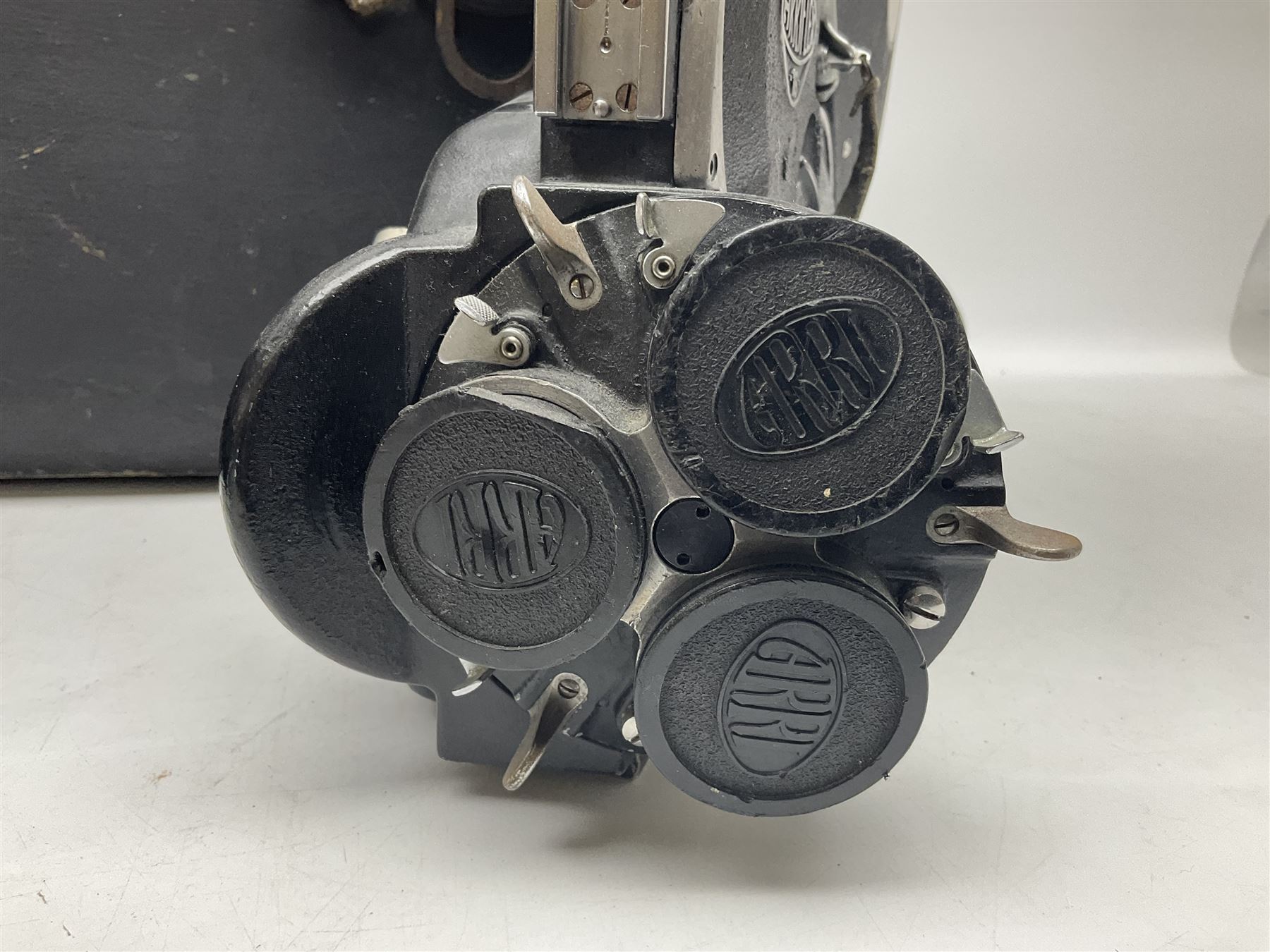 Arriflex 16 camera body, serial no. 11250, three 400ft magazines, cased filter set, 'Angenieux-Zoom Type 4x17.5B F.17.5-70mm' lens, serial no. 1199886 cases and other Addiflex equipment in hard case 