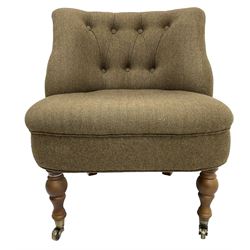 Victorian design tub shaped bedroom chair, upholstered in back-buttoned tweed fabric, on turned front supports with castors