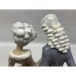 Lladro figure, Walk in Versailles, modelled as a man and woman in period dress, sculpted by Vincente Martinez, no 5004, year issued 1978, year retired 1981, H40cm 