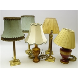  Set of four brass Corinthian Column candlesticks and two other table lamps (H56cm max) (6)  