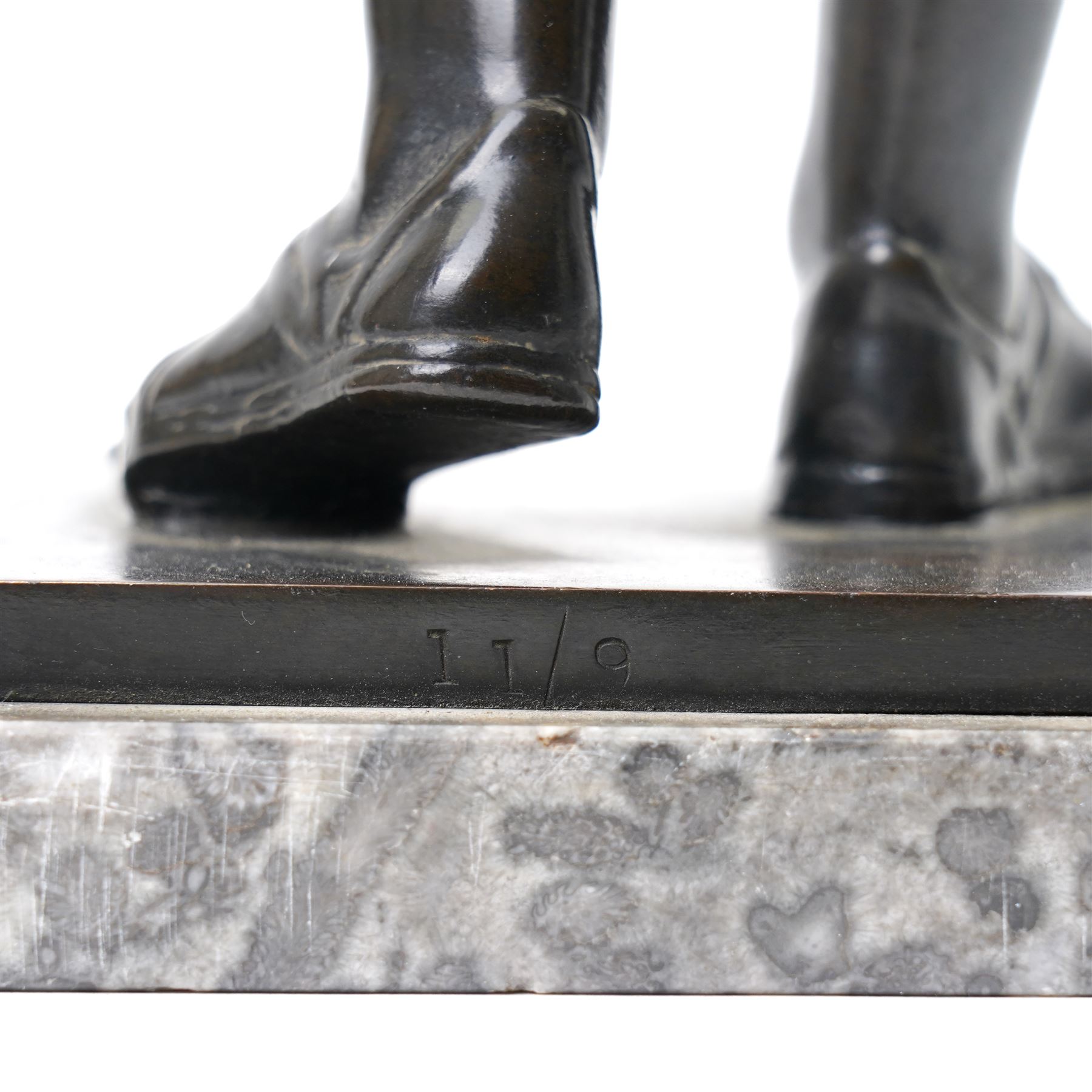 After the Antique - Grand Tour patinated bronze figure of a Vestal Virgin, the maiden standing in contrapposto, draped in classical robes and pinning her chiton at the shoulder and chest, on a square marble base stamped to rear, circa 1900, W15cm H47cm