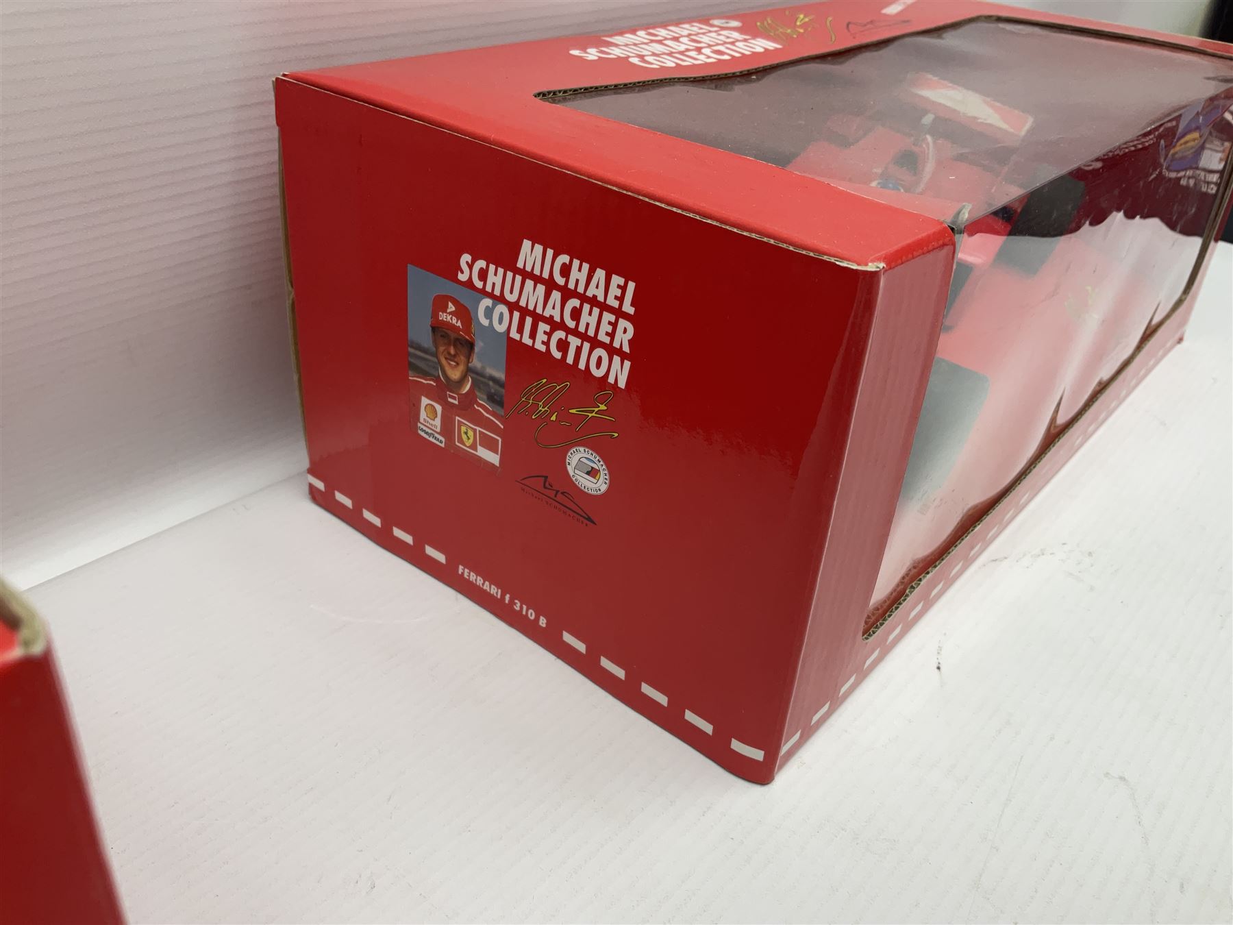 Four Paul's Model Art 1:18 scale Michael Schumacher Collection die-cast racing cars - Ferrari F310B; Ferrari F310/2; Benneton Renault B195; and Ferrari F300; all boxed (4)