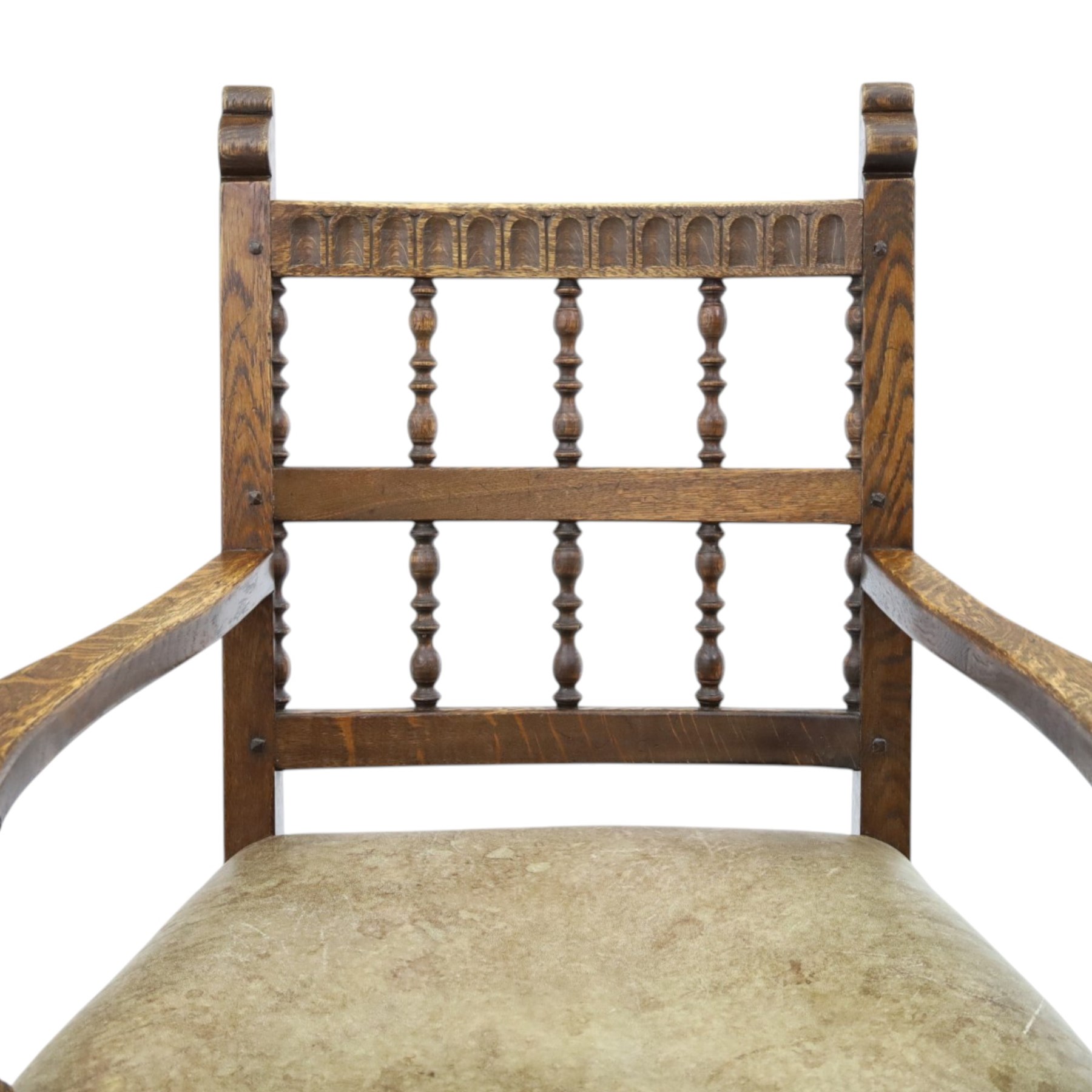 Rupert Griffiths for Monastic Woodcraft - oak 6ft refectory dining table with set six (4+2) matching chairs, rectangular top with arcaded frieze, with trestle base with further arcaded carved stretchers, chairs with carved rails and finials, leather wrapped seats with stud detail, turned supports united by carved stretcher