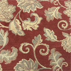 Rutland two seat sofa upholstered in a red ground fabric with floral pattern, W144cm