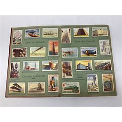 Magnus Laurie: The West Riding Territorials in the Great War. 1920: German Haus Neuerburg cigarette card album entitled Der Bunte Rock depicting 19th century military uniforms; French Chocolat Aiglon trade card album including some military costumes; and a cigarette card album, some of military interest (4)