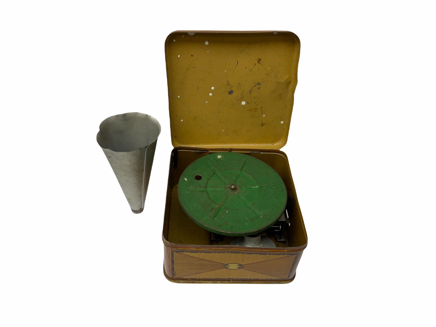 Gebruder Bing Germany Pigmyphone child's portable toy gramophone in woodgrain finish tin-plate box with key and tin of needles L15cm; and nine small records of nursery rhymes; together with a Japanese tin-pate 'Skip Rope Animals' clockwork toy, boxed.