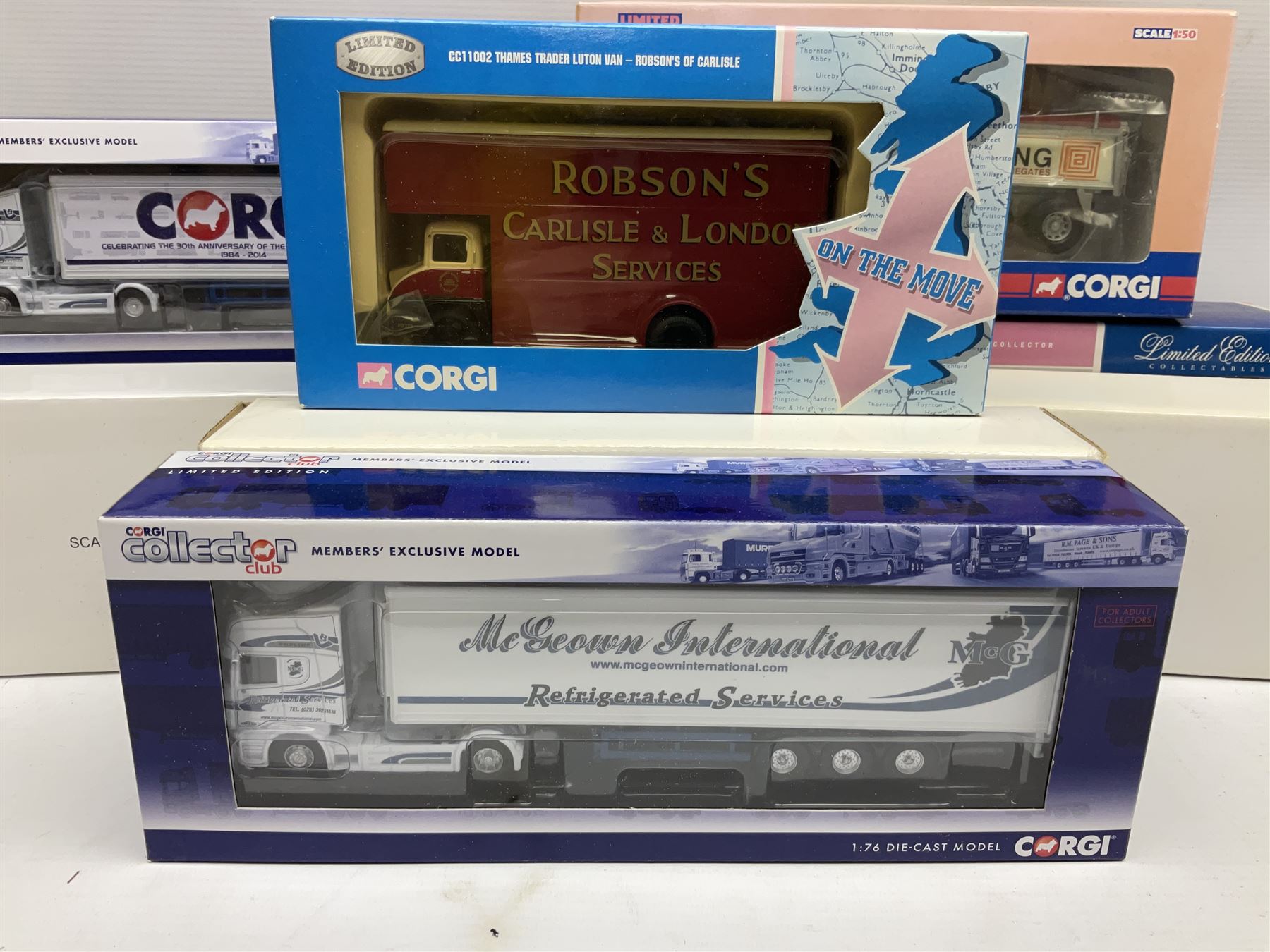 Corgi - nine lorries comprising CC13609 DAF CF Tipper Thomas Armstrong Holdings Ltd; CC12415 Volvo FH Globetrotter Bulk Tipper Hinchcliffe; CC11002 Thames Trader Luton Van Robson's of Carlisle; Hornby Car Transporter; and five Collector's Club Models; all boxed but three Club models in delivery packaging only (9)