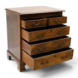 George III mahogany bachelors chest, rectangular top with moulded edge, fitted with brushing slide over two short and three long cock-beaded drawers with brass swan-neck handles, lower moulded edge on bracket feet