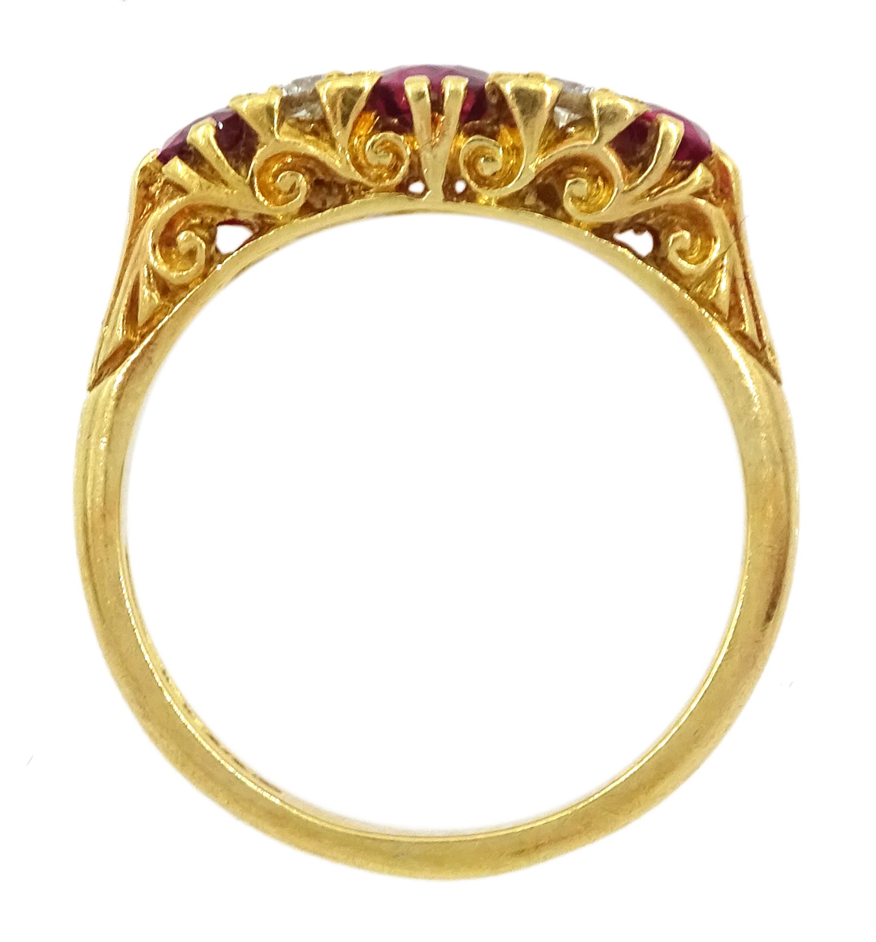 18ct gold three stone oval cut ruby and four stone round brilliant cut diamond ring, Birmingham 1972
