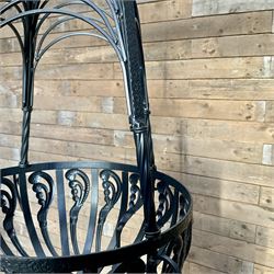 Pair of black finish wrought metal hanging baskets, with brackets