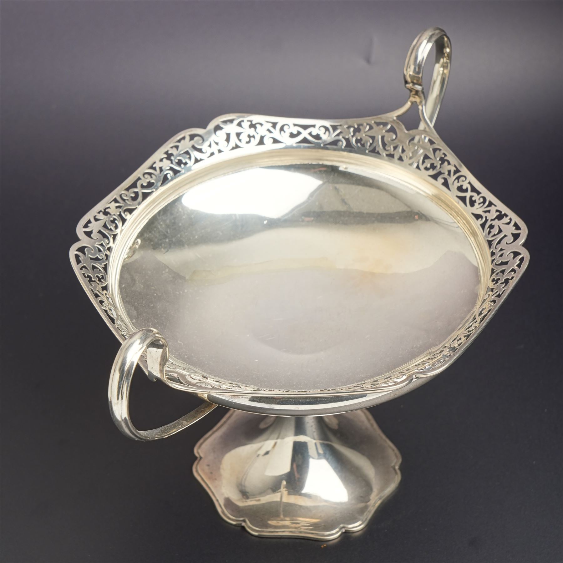 Silver two handled fruit dish with pierced border on a pedestal foot D18cm Birmingham 1912  