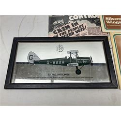 Amy Johnson - collection of memorabilia and ephemera including Amy Johnson Lone Girl Flyer by Charles Dixon and other books; mounted Punch cartoon 'Johnsoniana'; two boxed Oxford Die-Cast model aircraft; photographs; postcards; First Day Covers etc
