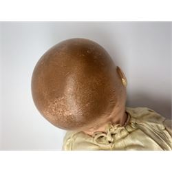 Seyfarth & Reinhardt composition head baby doll with moulded hair, sleeping flirty eyes, open mouth with one tooth and tongue and soft body with composition jointed limbs, marked 'SuR Germany 30/5' H47cm; together with a Golborne Dolls 'Golborne Beauty' composition head and body bride doll, marked 'F.P.23' in original box H63cm (2)