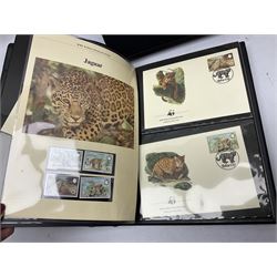 Stamps and Royal Mail postcards, including small number of George V postal history interest items, WWF interest stamps, mixed stamps in packets etc, housed in various albums and loose, in one box