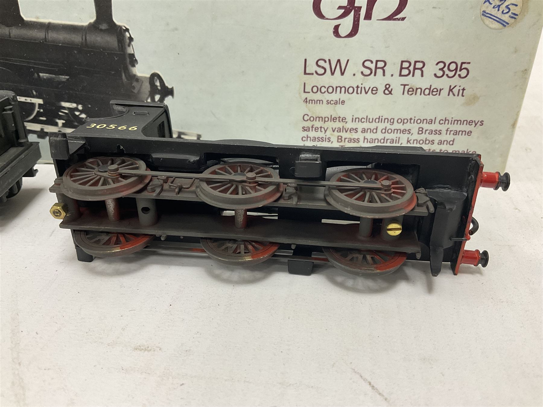 ‘00’ gauge - two kit built steam locomotive and tenders comprising Class 0395 Jumbos 0-6-0 no.30566 finished in BR black; Class C2X Large Vulcans 0-6-0 no.32434 finished in BR black; both with DJH Models boxes (2) 