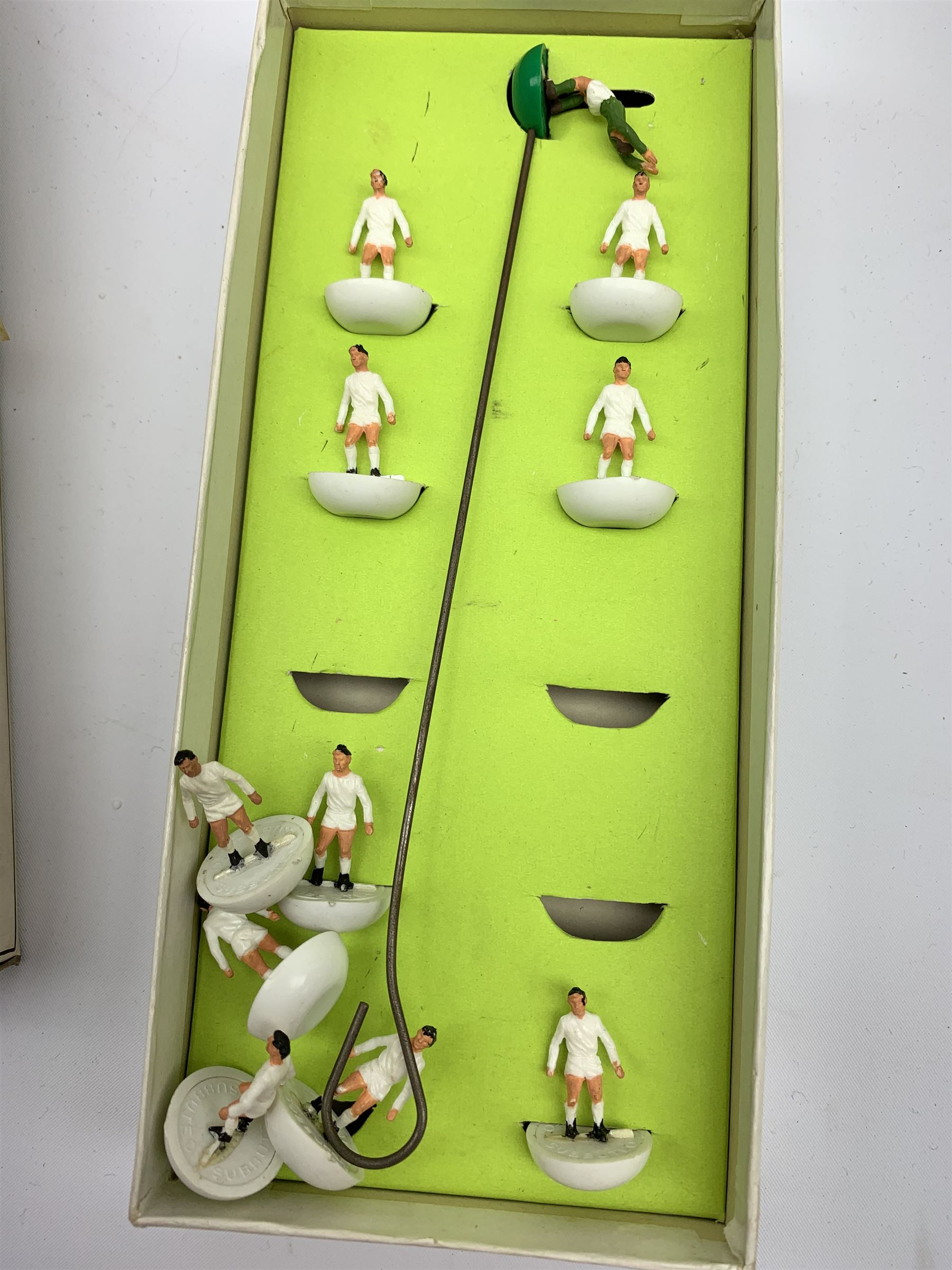 Subbuteo table soccer game with two teams, goals, balls, playing