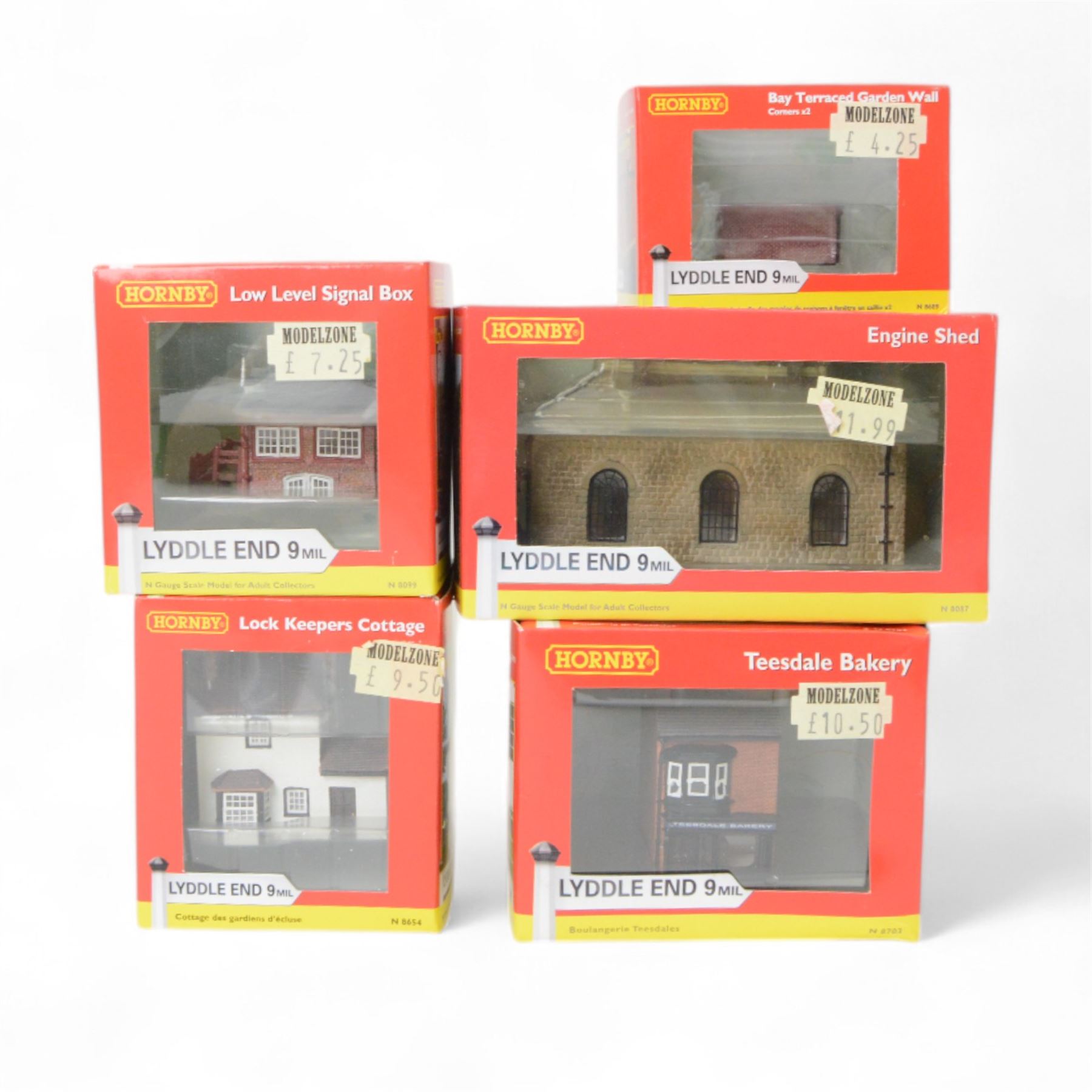 Thirty Hornby N gauge Lyddle End model railway trackside buildings, including N8031 Holy Trinity Church, N8575 Coal Drop, N8033 Radcliffe's Newsagent and N8002 Small Waiting Room, all boxed