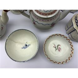 Two19th century relief moulded Castleford teapots, and lidded sucrier, largest teapot H14.5cm, together with three 18th century New Hall type teapots, an early 18th century saucer, and an 18th century blue and white bowl.