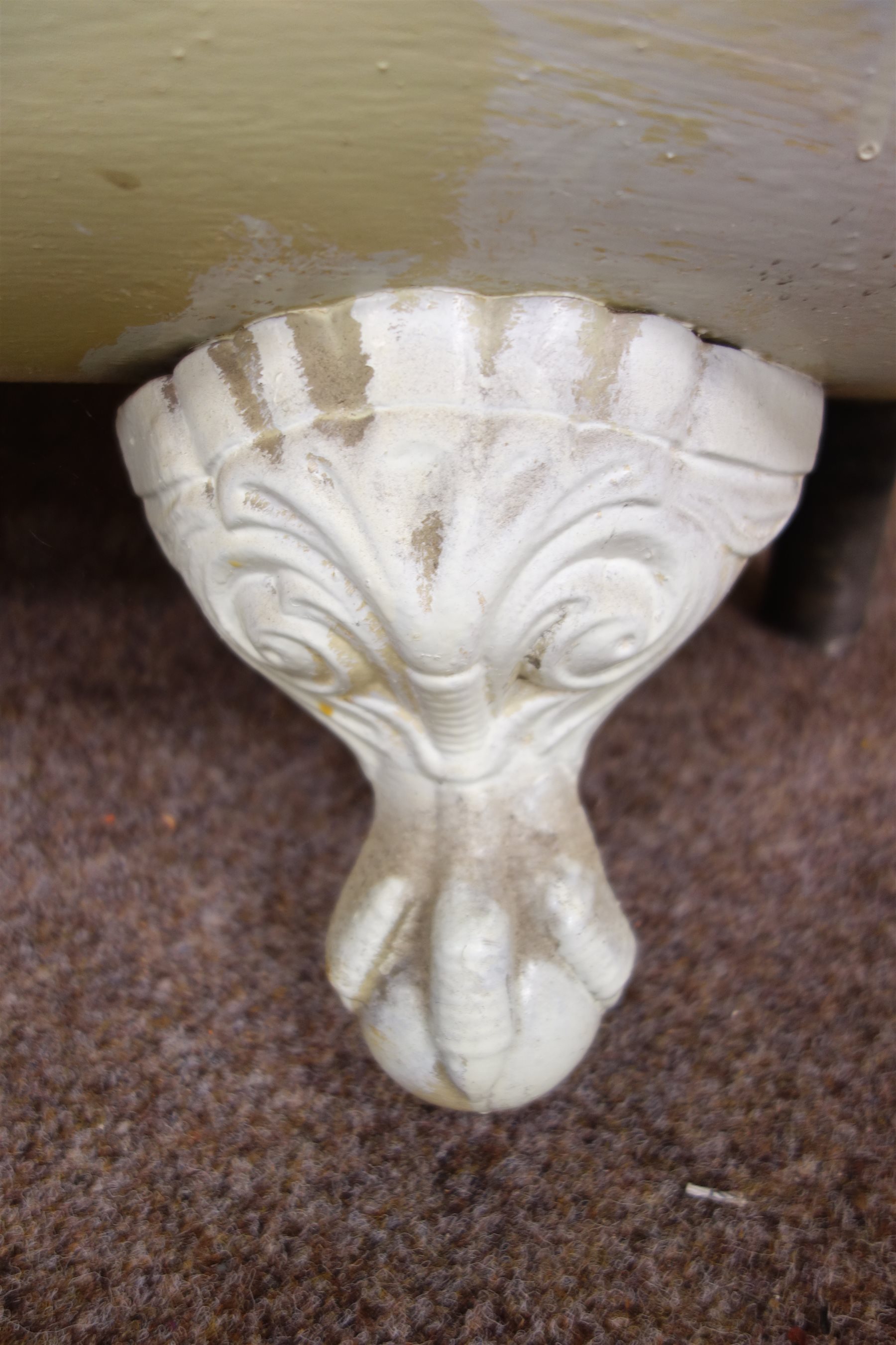 Victorian style cast iron roll top enamelled bath, on ball and claw