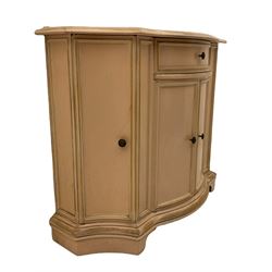 Painted shaped front side cabinet, fitted with four cupboards and single centre drawer