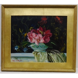  Still Life of Roses in Front of an Aquarium, oil on board signed by Charles Merrill Mount (American 1928 - 1995) 37cm x 45cm  